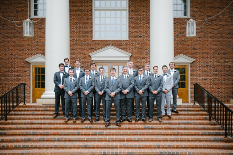 groomsmen and ushers stand on steps of Furman chapel, groomsmen portraits, Furman chapel, Furman wedding, greenville wedding photography